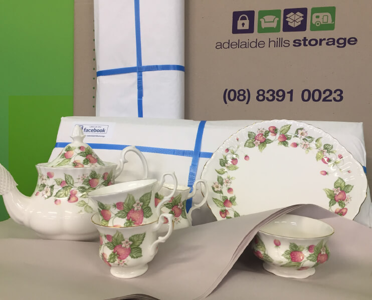 Fine China tea set on top of packaging paper